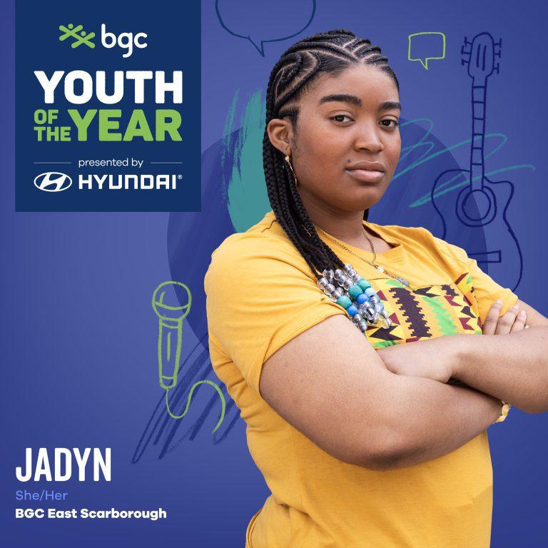 A young woman named Jadyn, from BGC East Scarborough, stands with her arms crossed in front of a blue background featuring the "BGC Youth of the Year" logo.