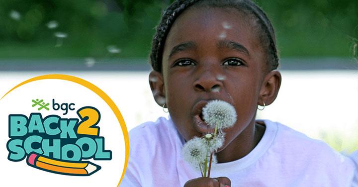 Young girl blowing a dandelion with “BGC Back 2 School” logo on the left.