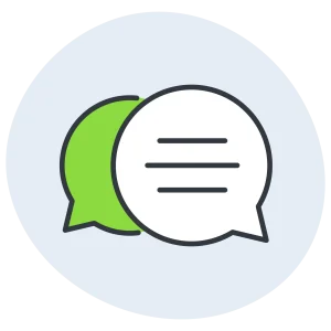 Two overlapping chat bubbles, one green and one white, symbolizing communication or dialogue.